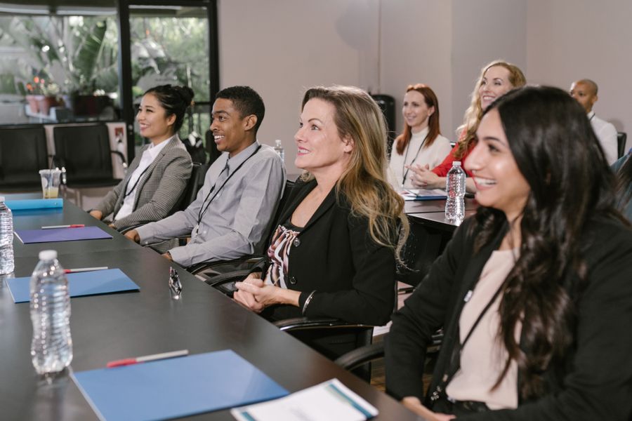 Delegates listening during a conference session